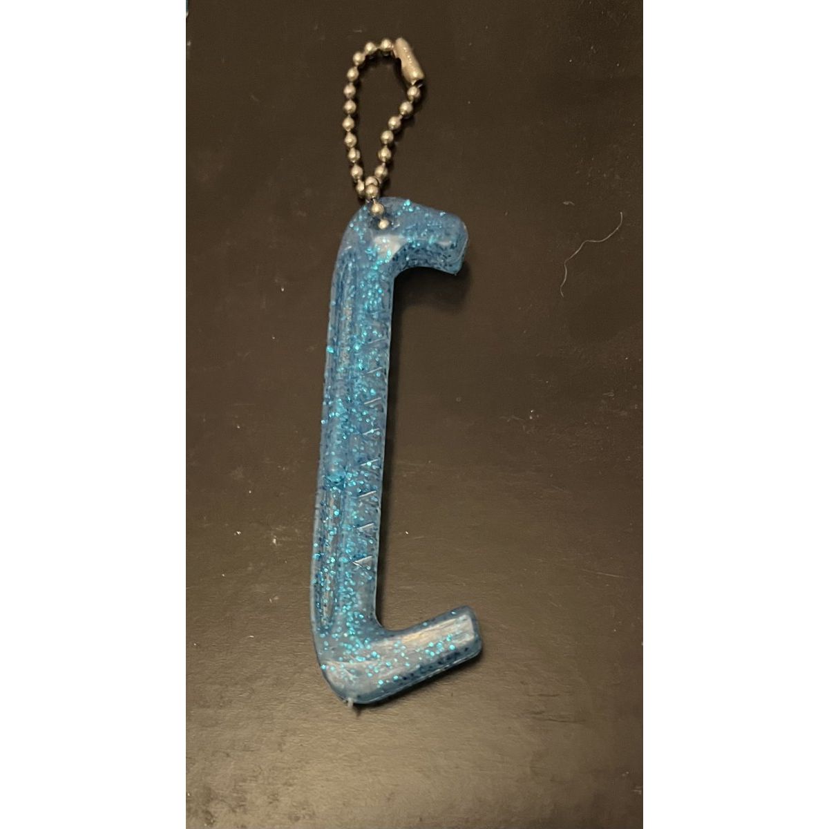 Keychain ice skate guard