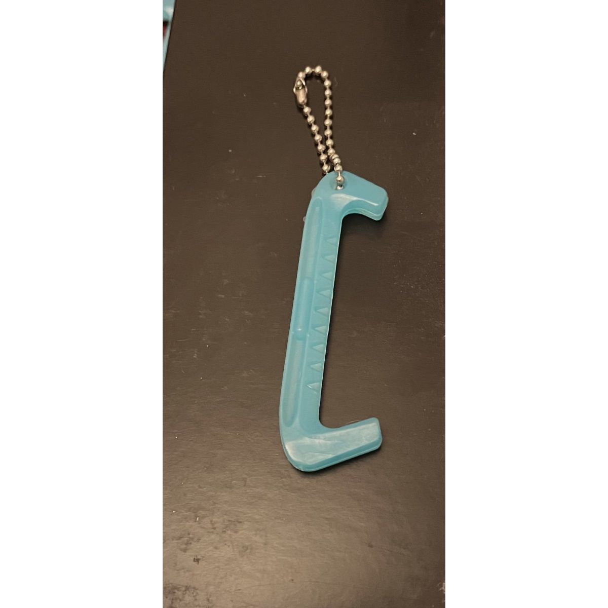 Keychain ice skate guard